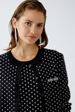 Cropped cardigan in black with spot in light grey