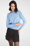 Acrylic sweater in sky blue with black stone detail