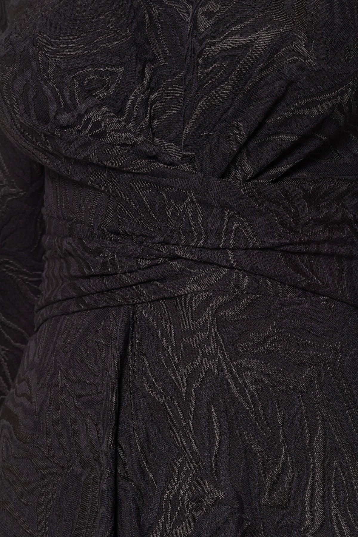 Black jersey dress. With swirl pattern
