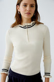 Off White Top with Navy Frills at Neck and Cuffs