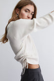 Ivory sweater with gather effect on both sides