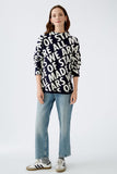 Viscose blend navy sweater with written pattern in cream