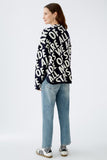 Viscose blend navy sweater with written pattern in cream