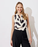 Draped sleeveless top in black and cream