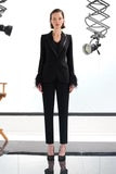 Black tuxedo jacket with detachable feather cuff