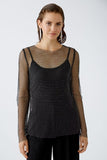 Glitter black mesh top over opaque strappy top in black